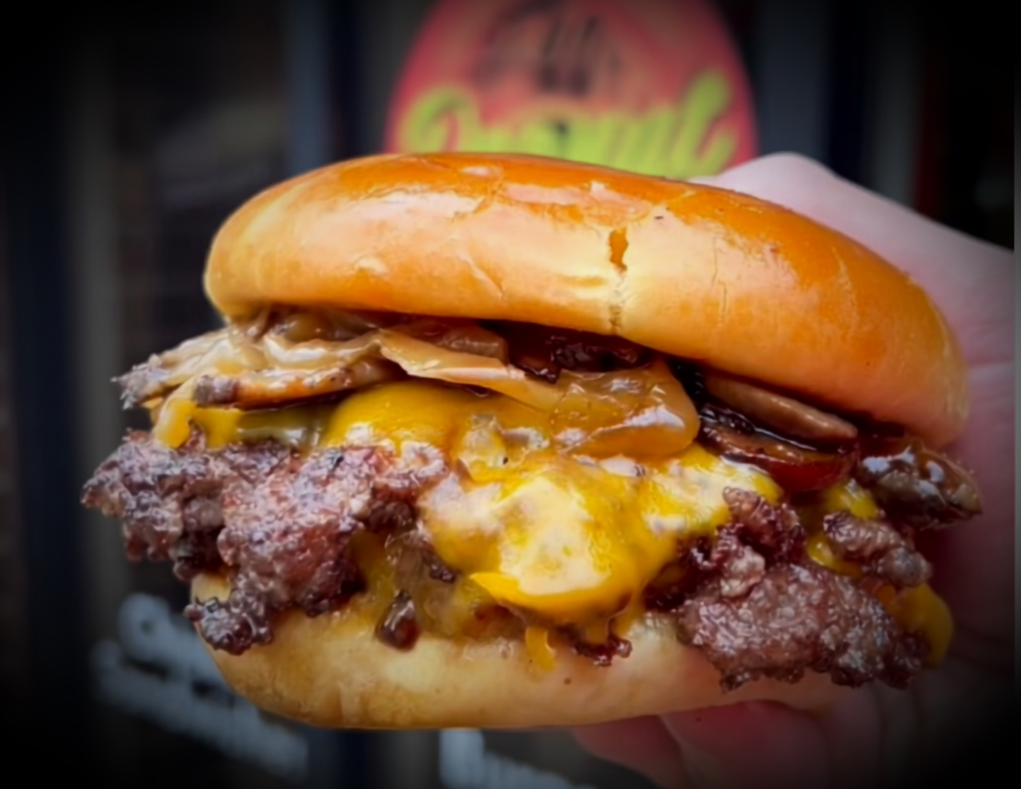 Peanut Gallery smash burger with cheddar, mushrooms, and caramelized onions